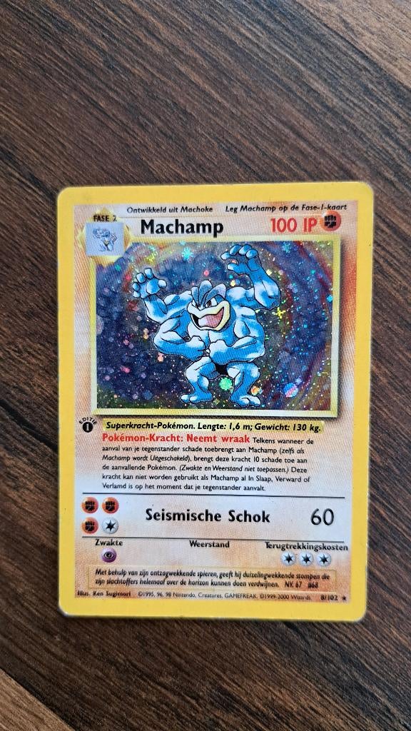 Machamp Base set 8/102 First edition, Hobby en Vrije tijd, Verzamelkaartspellen | Pokémon, Ophalen of Verzenden, Zo goed als nieuw