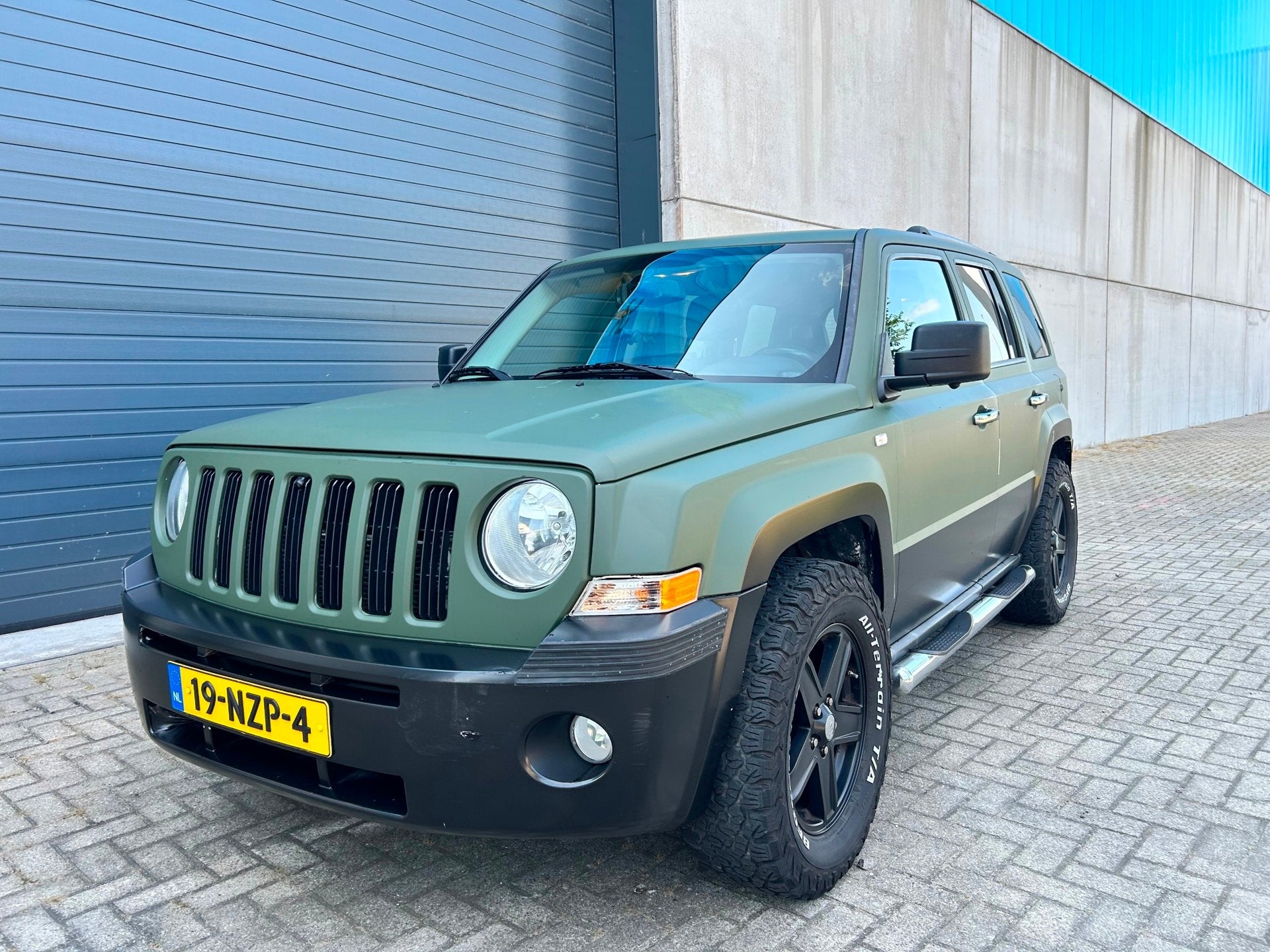 Jeep Patriot 2.4i Limited Liberty AUT LEDER CLIMA 4WD NAP, Auto's, Automaat, Euro 5, 450 kg, Gebruikt