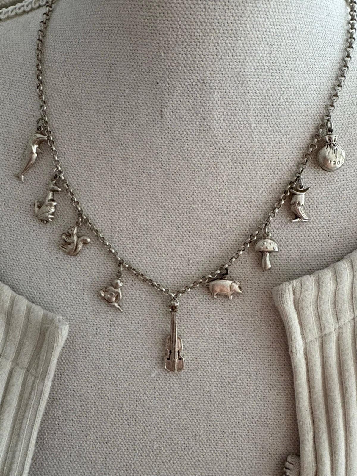 Antieke zilveren 835 bedelketting met 9 diverse bedels, Ophalen of Verzenden, Gebruikt, Zilver, Met hanger