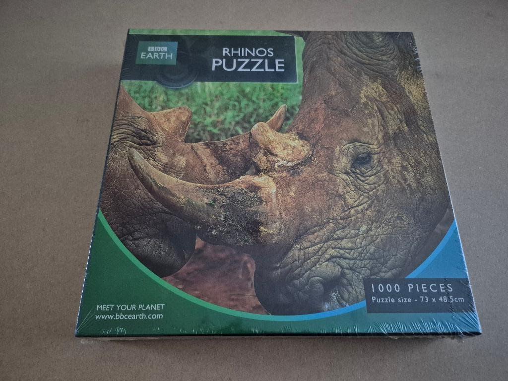 Dierenpuzzel, Neushoorn, BBC Earth, Meet your Planet, 1000., Hobby en Vrije tijd, Denksport en Puzzels, Ophalen of Verzenden, 500 t/m 1500 stukjes