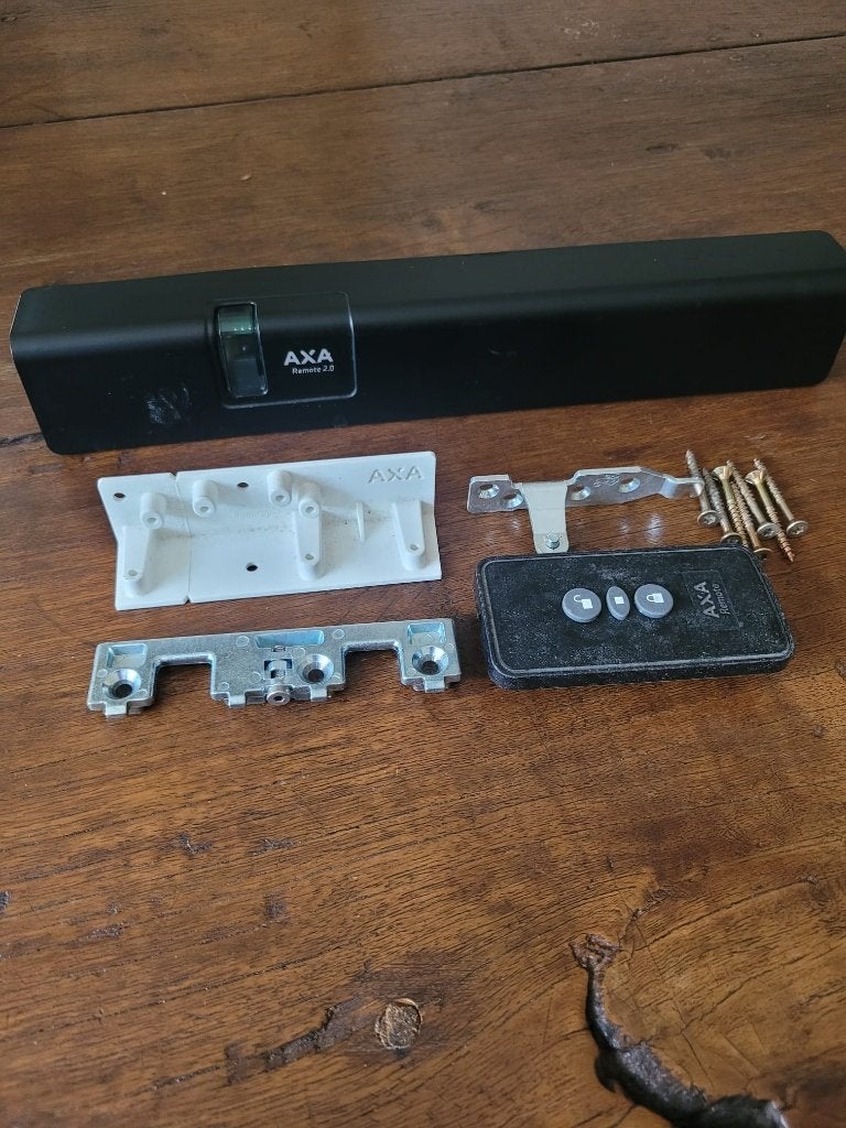 AXA Remote 2.0 klepraam raamopener met afstandsbediening, Doe-het-zelf en Verbouw, Ophalen of Verzenden, Zo goed als nieuw, Overige materialen