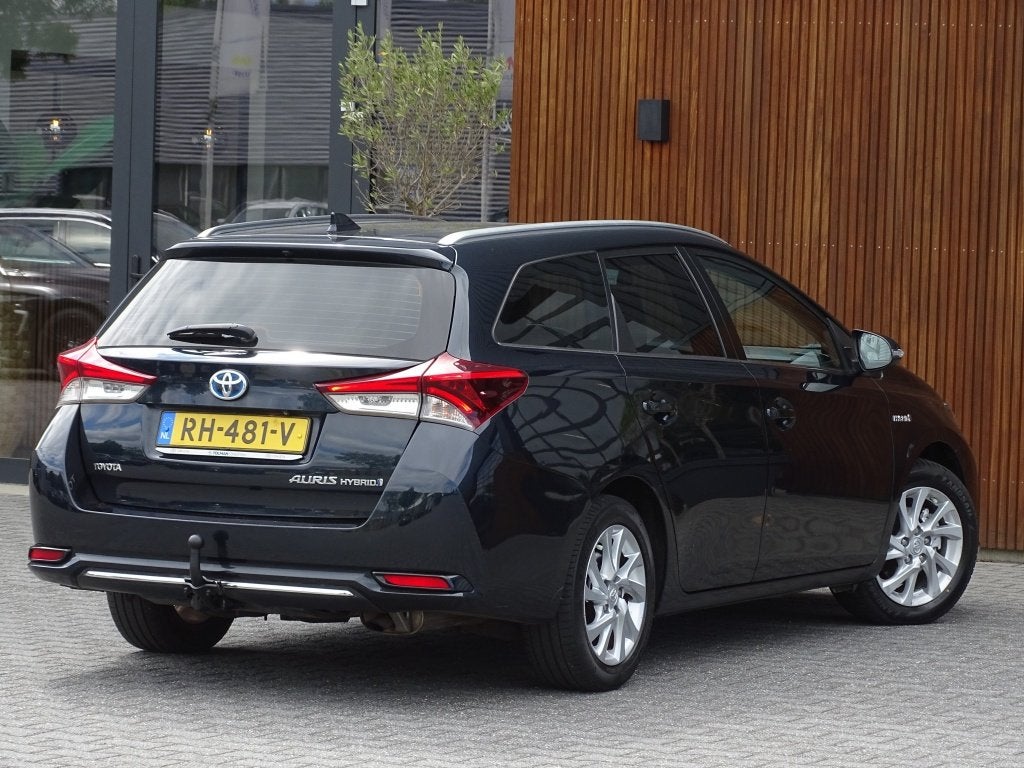 Toyota Auris Touring Sports 1.8 Hybrid 136PK / Dynamic Edit, Auto's, Automaat, Automatische klimaatregeling, Gebruikt, Euro 6