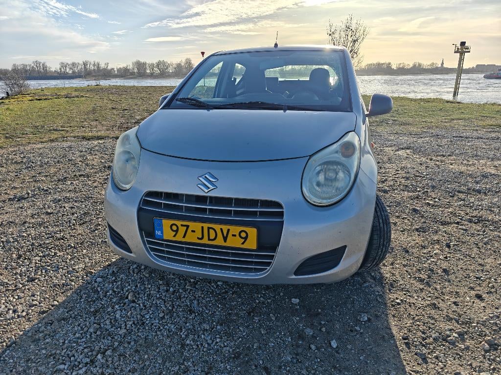 SUZUKI ALTO 1.0 2009 Grijs, Auto's, Voorwielaandrijving, Stof, 4 stoelen, Origineel Nederlands