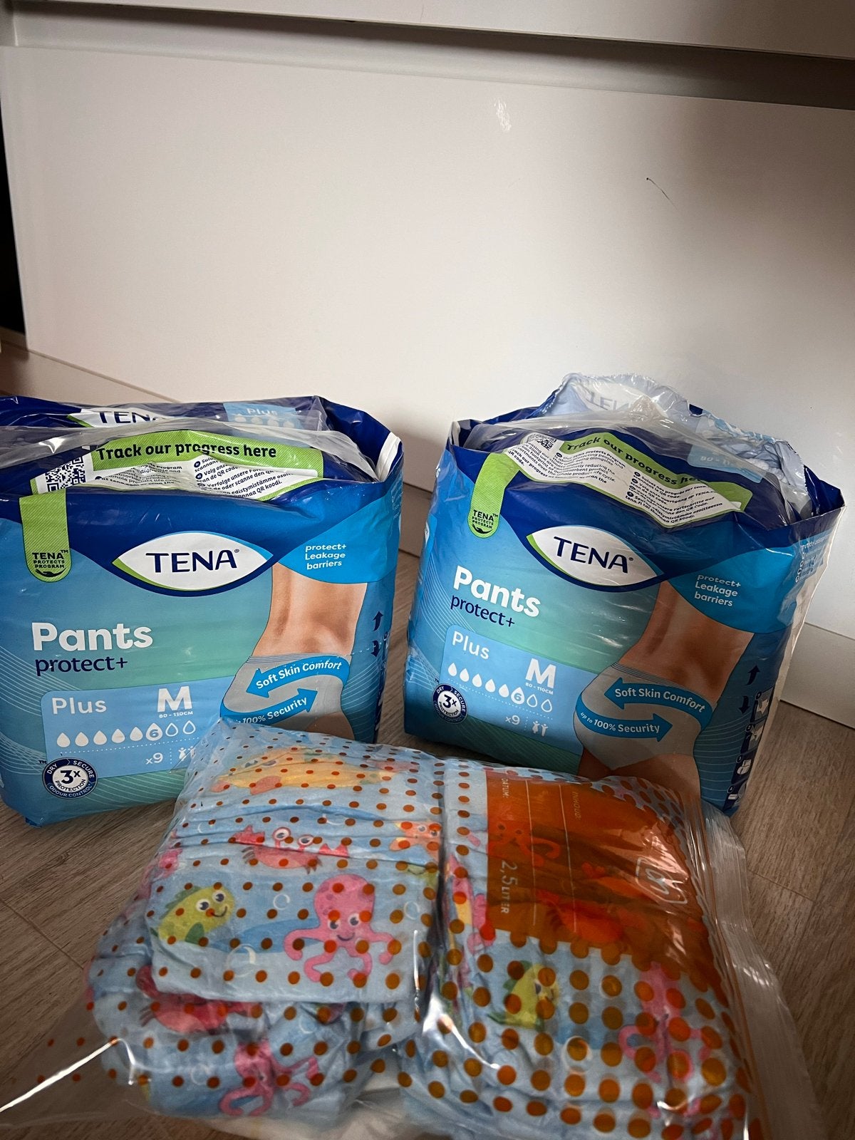 TENA Pants Protect+ (M) & Kruidvat zwemluiers, Ophalen of Verzenden, Zo goed als nieuw