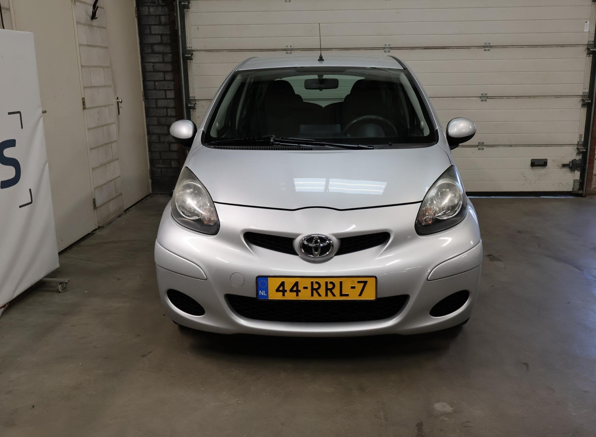 Toyota Aygo 1.0-12V Comfort Navigator NAP Airco Navi 12-26 A, Voorwielaandrijving, Euro 5, Gebruikt, 4 stoelen