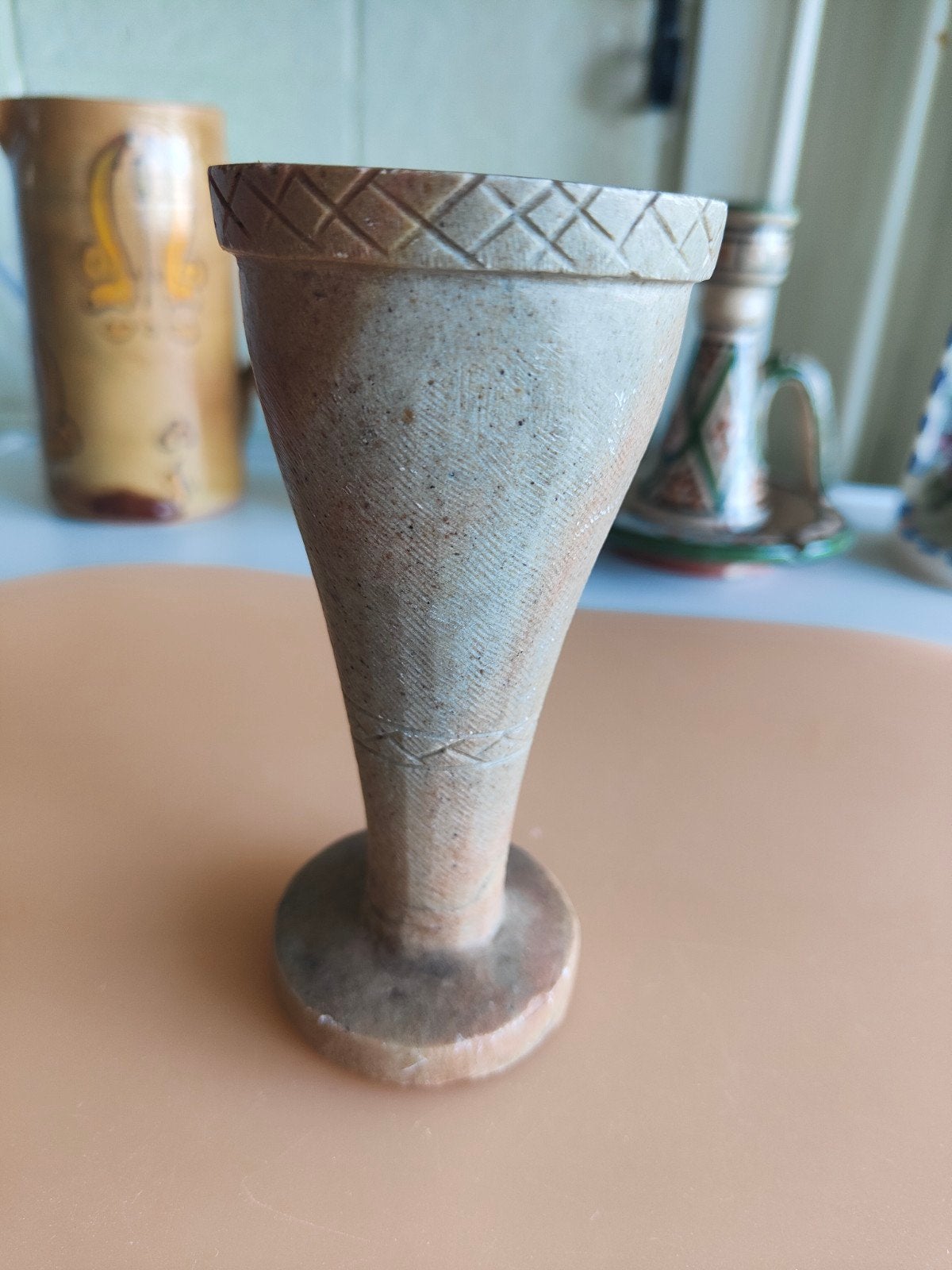 Decoratieve stenen beker/vaas, Ophalen