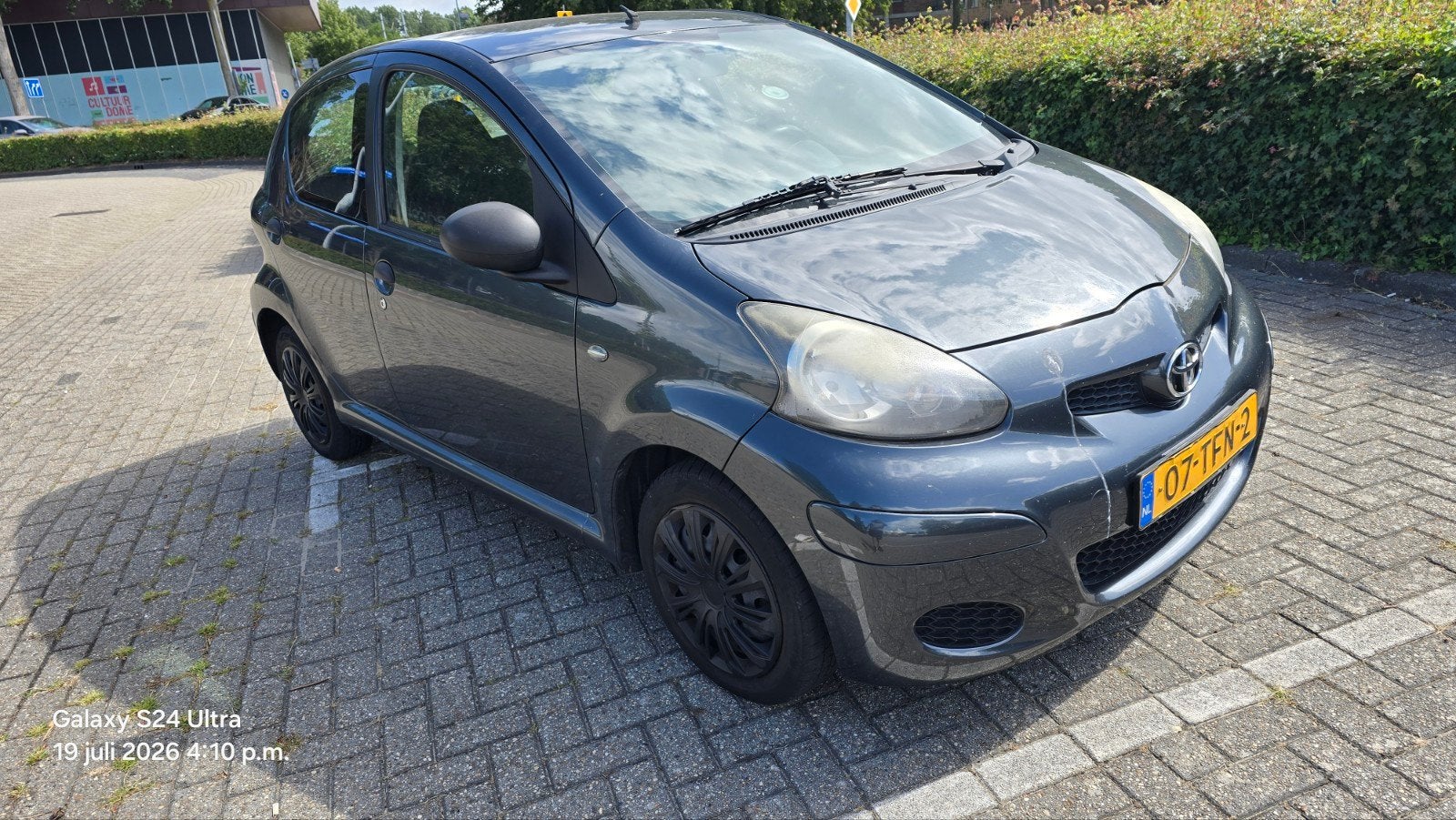 Toyota Aygo 1.0 12V Vvt-i 5DRS 2012 Grijs, Auto's, Toyota, Voorwielaandrijving, 4 stoelen, 68 pk, Origineel Nederlands