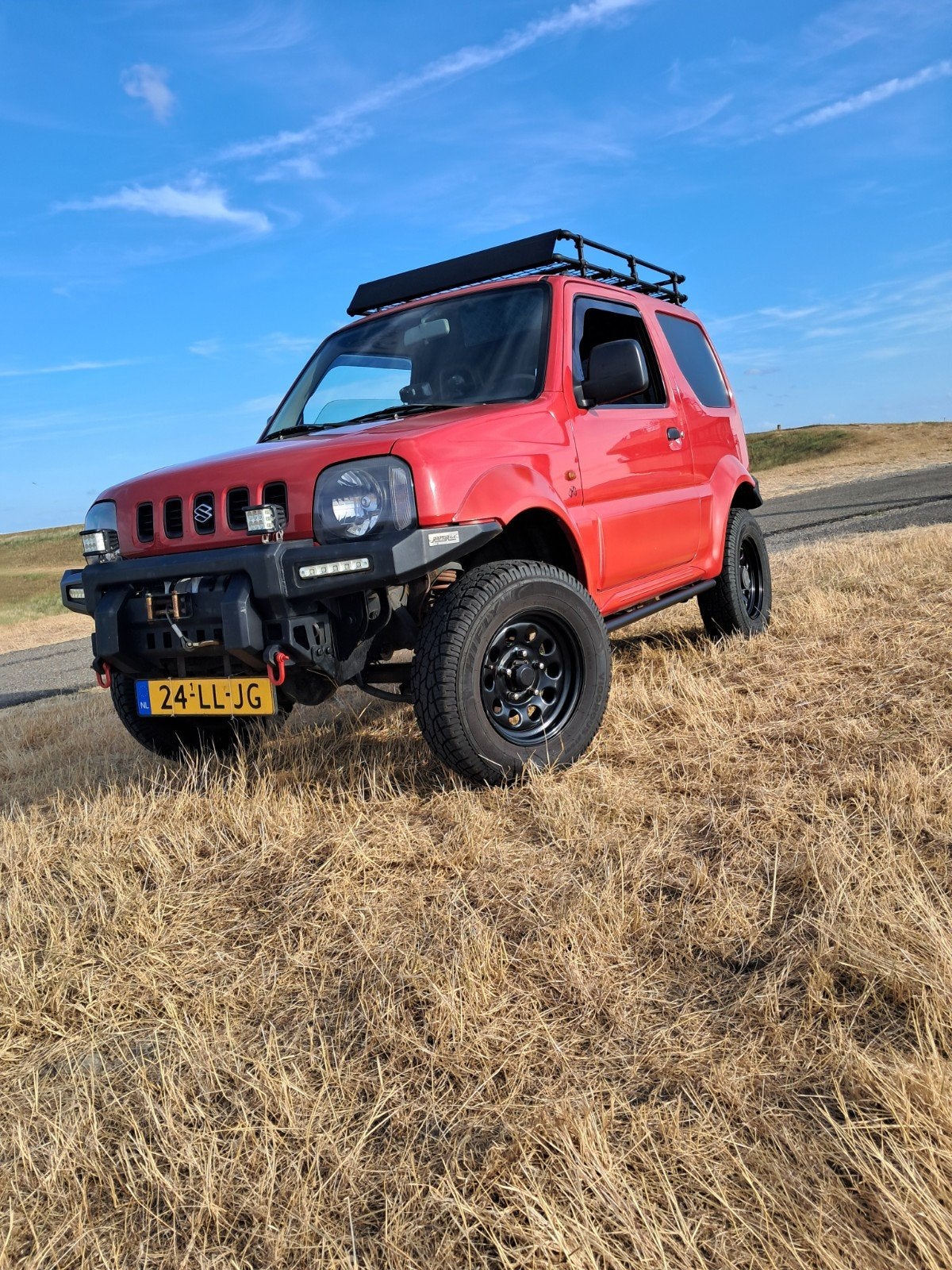 Suzuki Jimny 1.3 JX 4WD 2003 Rood, 13 km/l, 40 €/maand, 4 cilinders, 4 stoelen