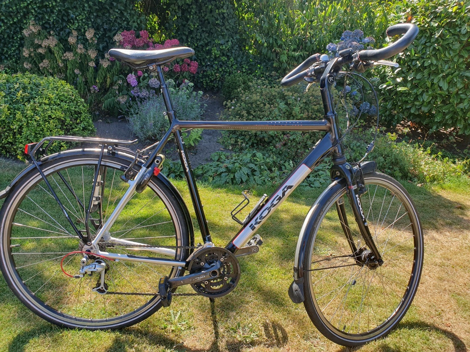 Sportieve Koga heren toerfiets, Fietsen en Brommers, Ophalen, Gebruikt, Vering, 57 tot 61 cm