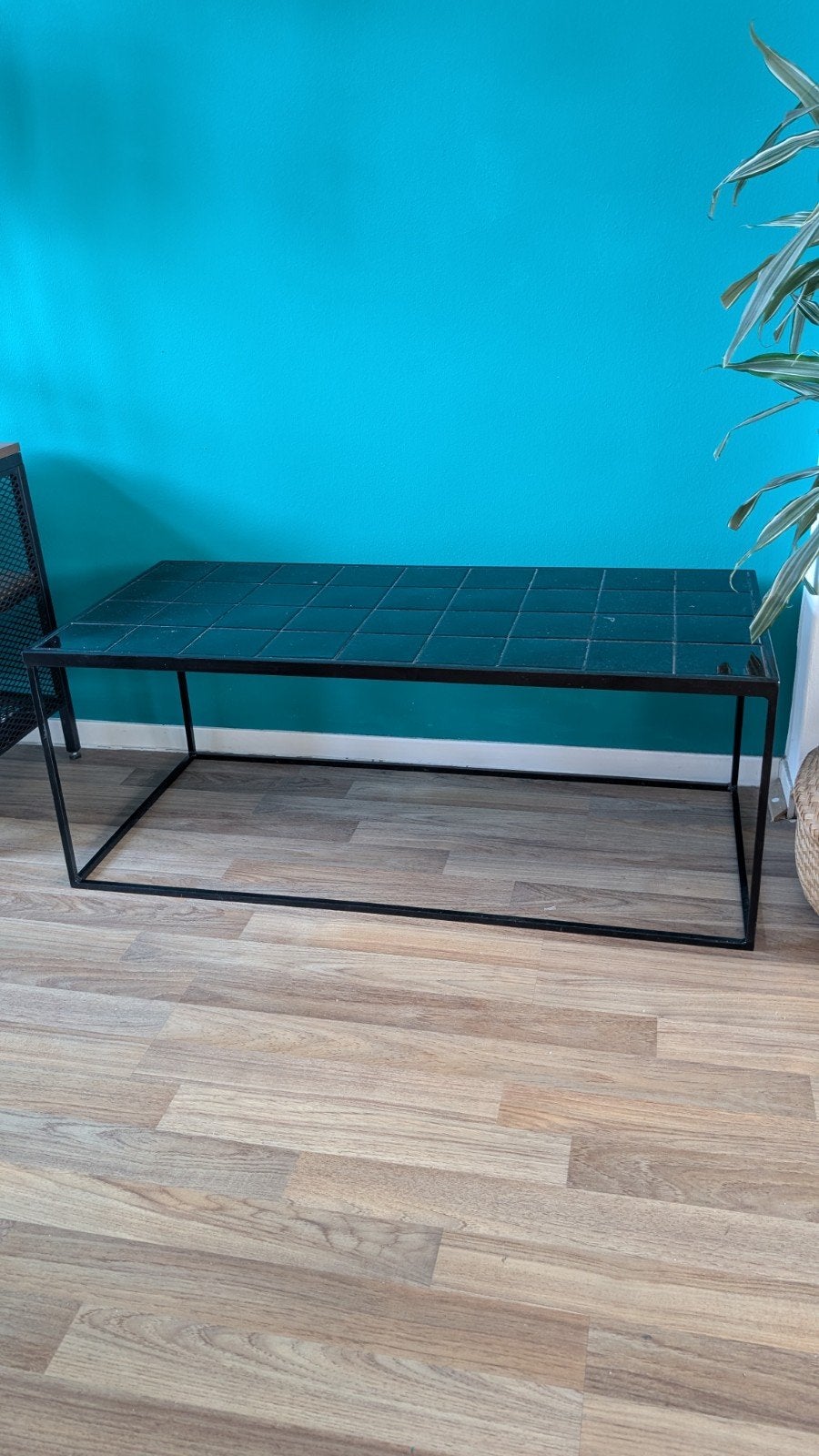 Zwarte tafel met tegelblad, Ophalen