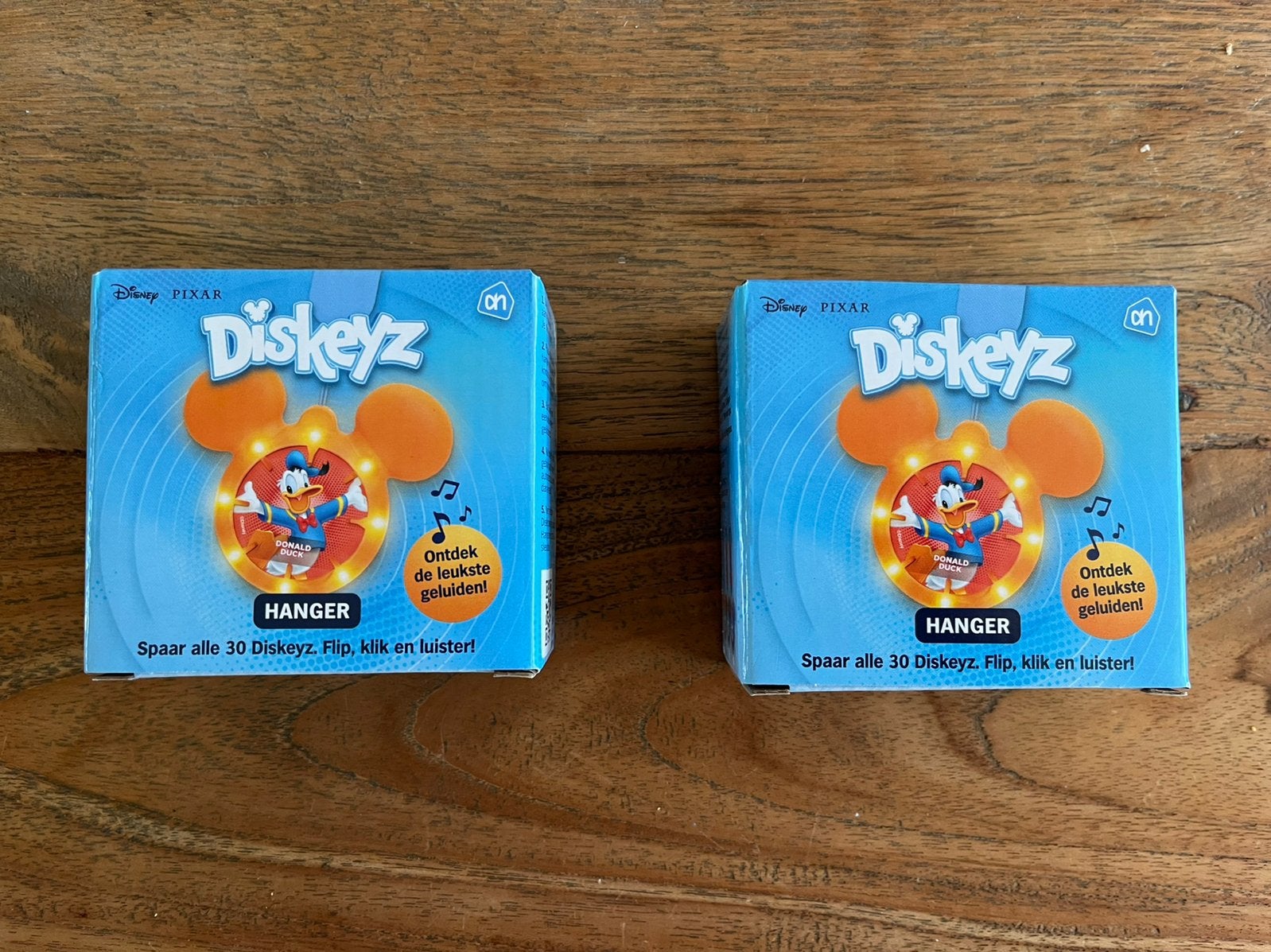 NIEUW - Twee oranje Diskeyz AH hangers, Albert Heijn, Ophalen of Verzenden