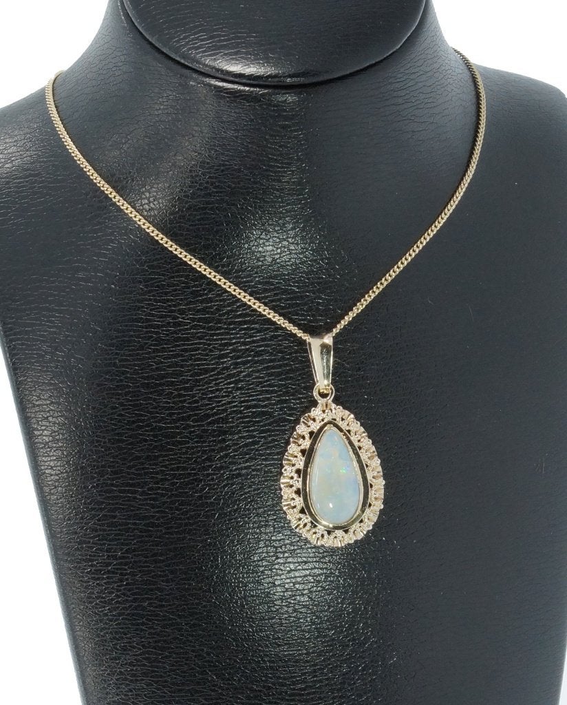 Opaal edelsteen fraaie 14k gouden ketting hanger dames, Voordeelsieraden, Ophalen of Verzenden, Zo goed als nieuw, Met edelsteen