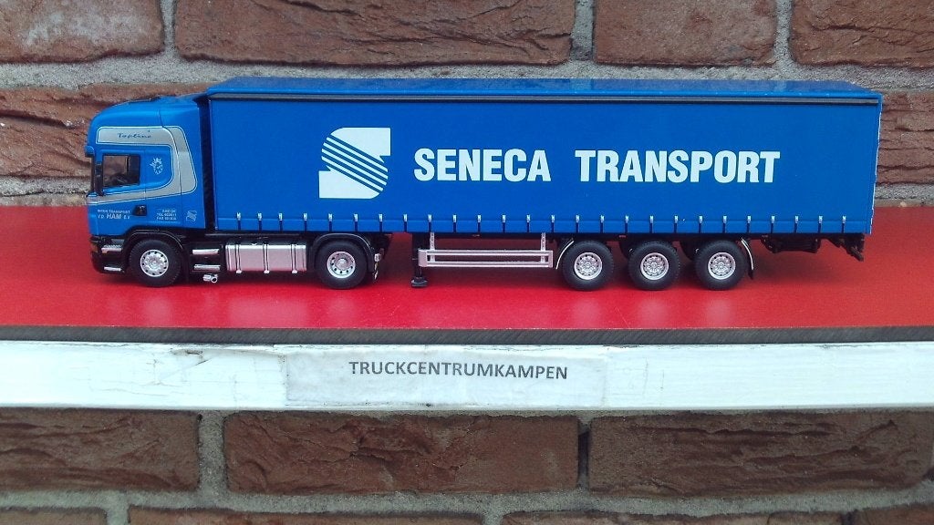 WSI  Scania  met  Tautliner  van  Seneca  Transport.
