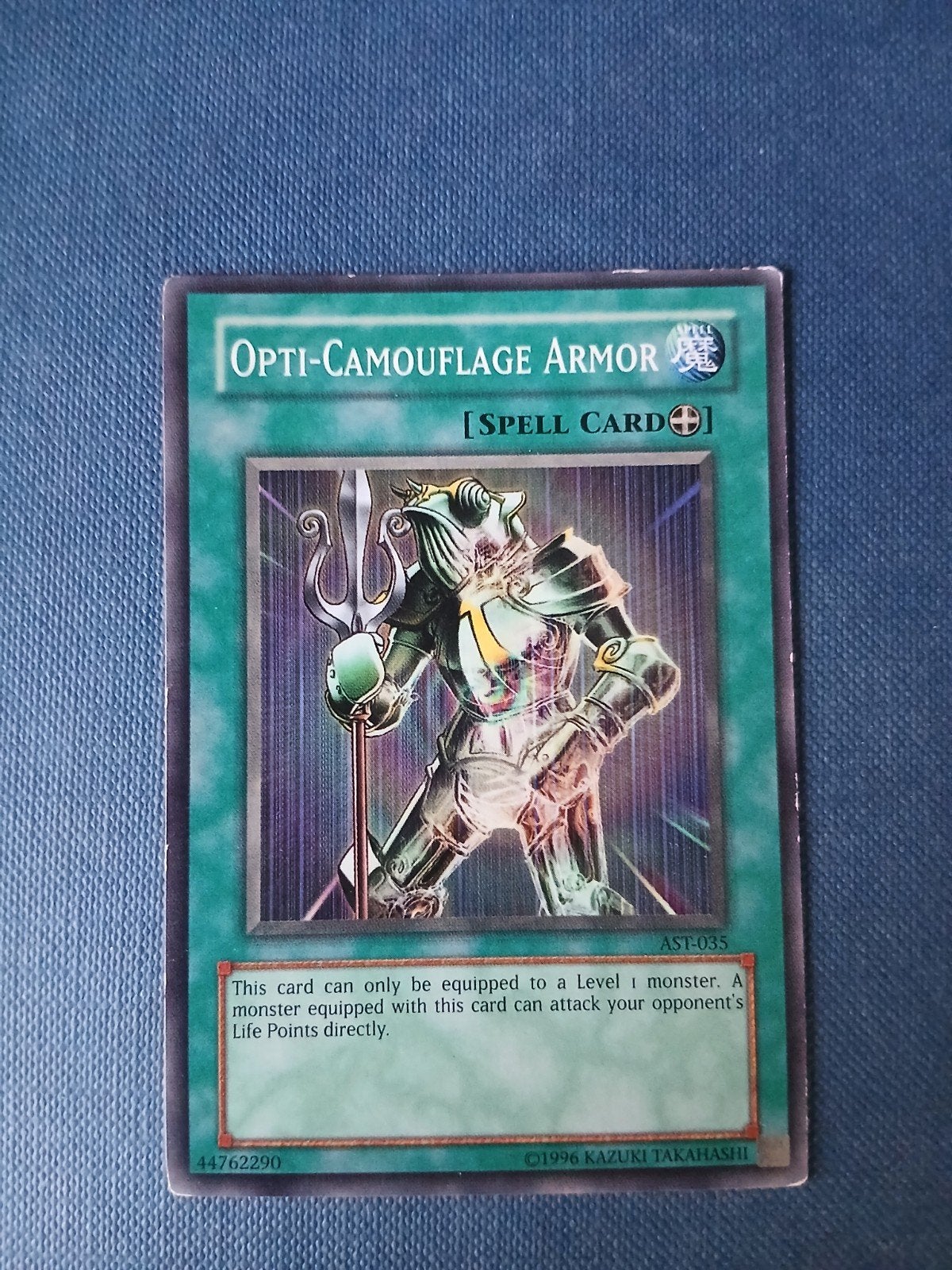 Yu-Gi-Oh! Opti-Camouflage Armor Spell Card AST-035, Ophalen of Verzenden, Gebruikt, Losse kaart