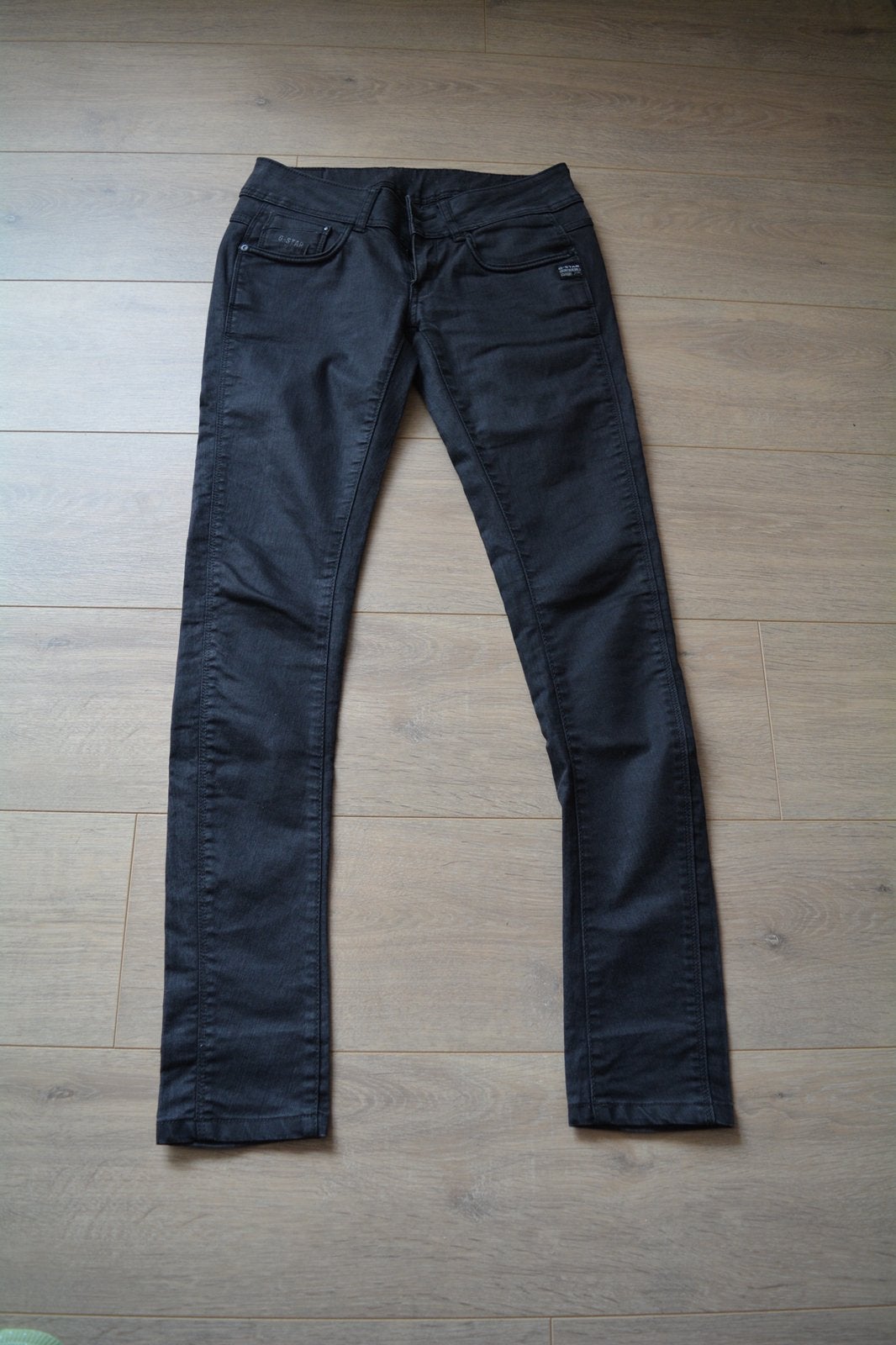 G-Star low rise skinny jeans in zwart coated denim W27L32, Ophalen of Verzenden, Gedragen, Zwart, W27 (confectie 34) of kleiner