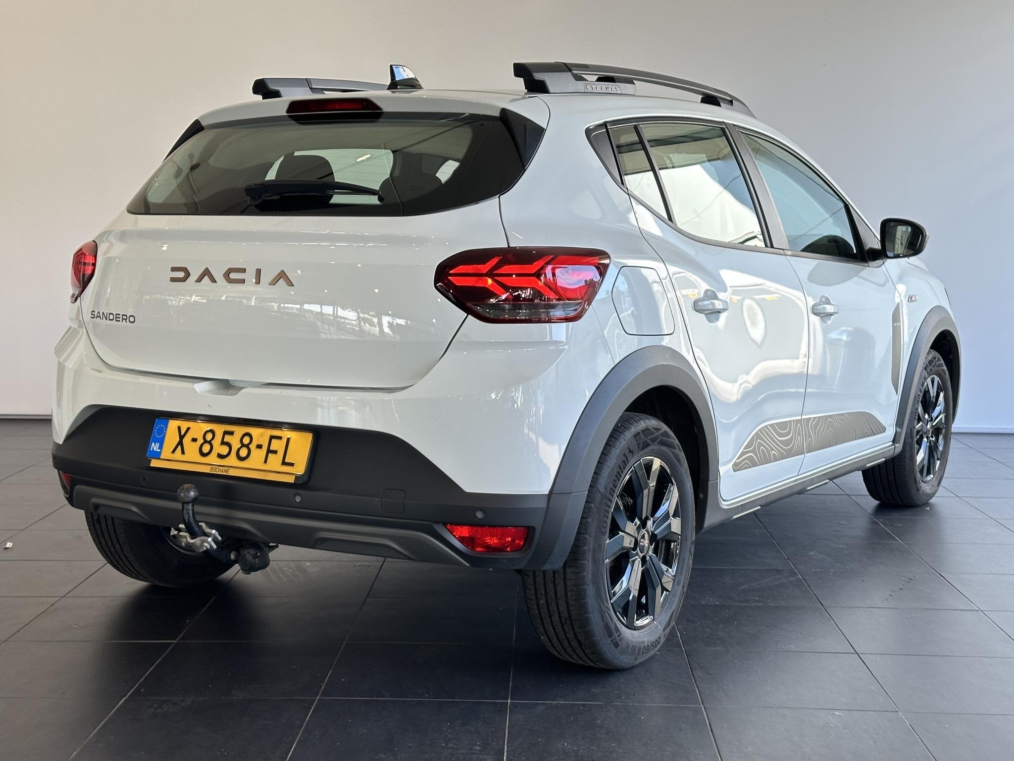 Dacia Sandero Stepway 1.0 TCe 100 ECO-G Extreme TREKHAAK | A, Auto's, Gebruikt, Met garantie (alle), 610 kg, Wit