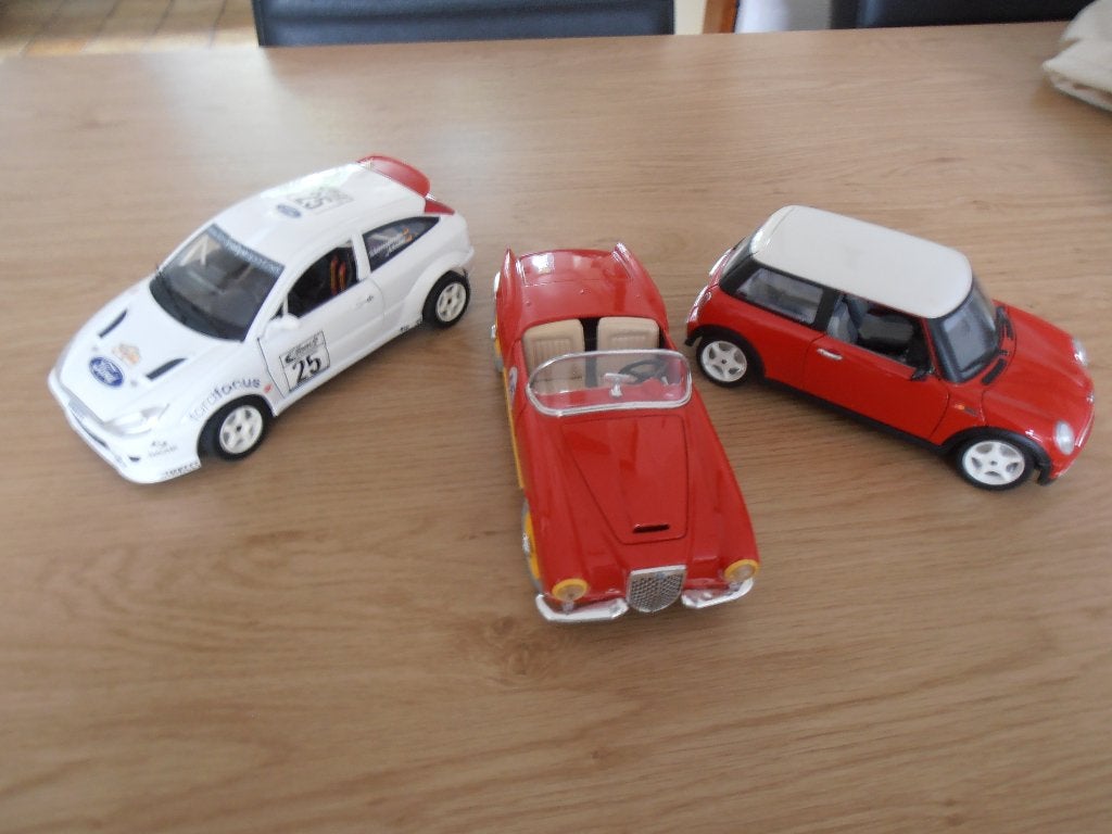Modelauto's:   Ford Focus,  Lancia en Mini Cooper, Ophalen of Verzenden, Zo goed als nieuw, Bburago