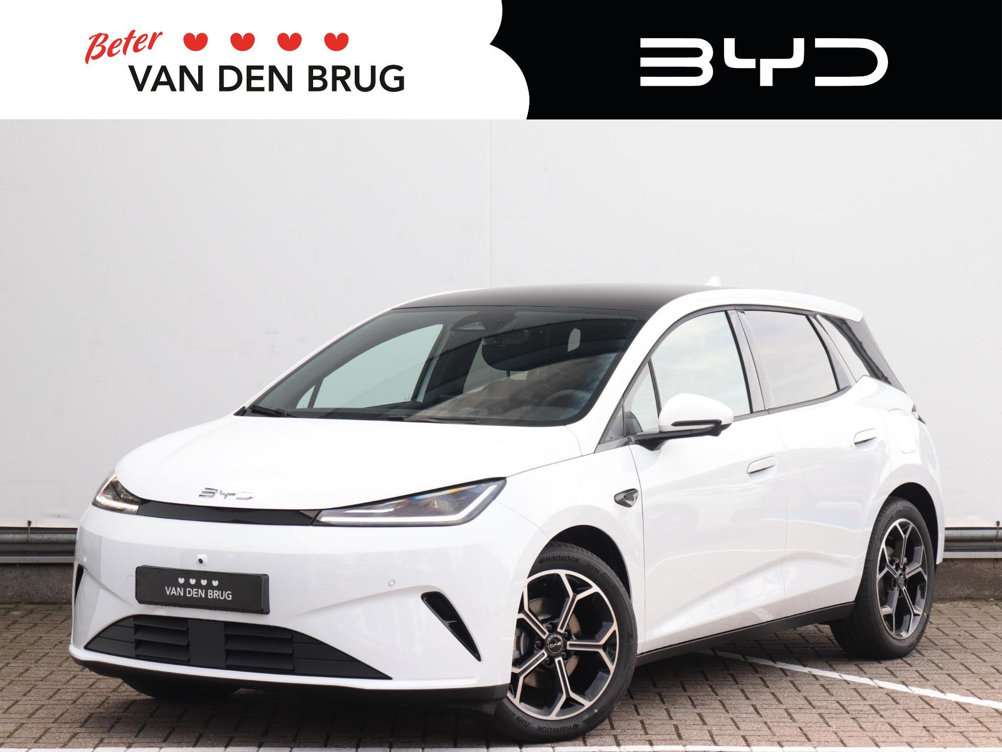 BYD DOLPHIN G 1.5L DM-i Comfort | Oxford White! | 105km elek, Auto's, Dolphin, 4 cilinders, Leder en Stof, Wit