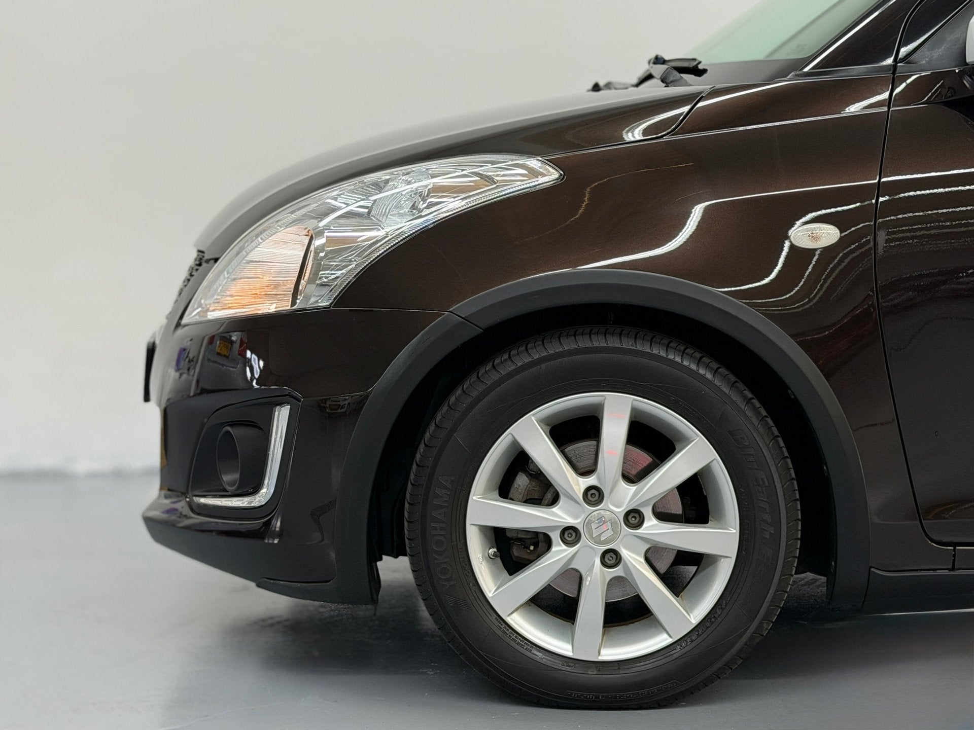 Suzuki Swift 1.2 Dynamic EASSS Led Airco Cruise Stoelverwarm, Auto's, Stof, Gebruikt, 4 cilinders, Bruin