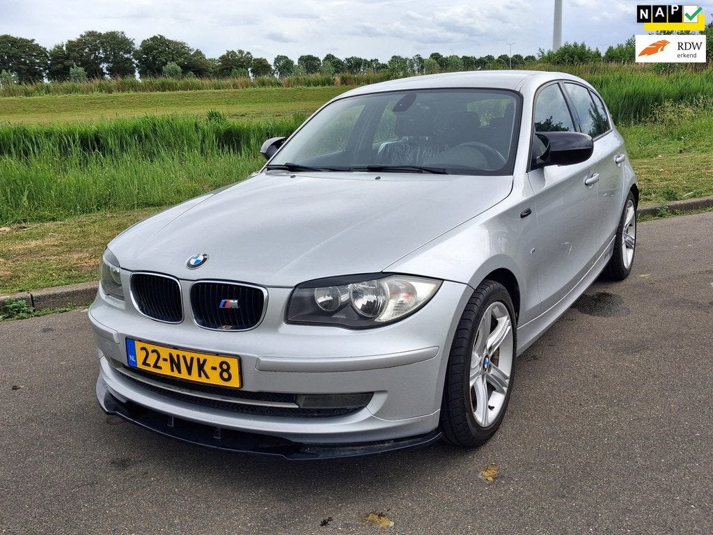 BMW 1-serie 116i Business Line, Auto's, BMW, 1-Serie, Euro 5, Achterwielaandrijving, Zwart