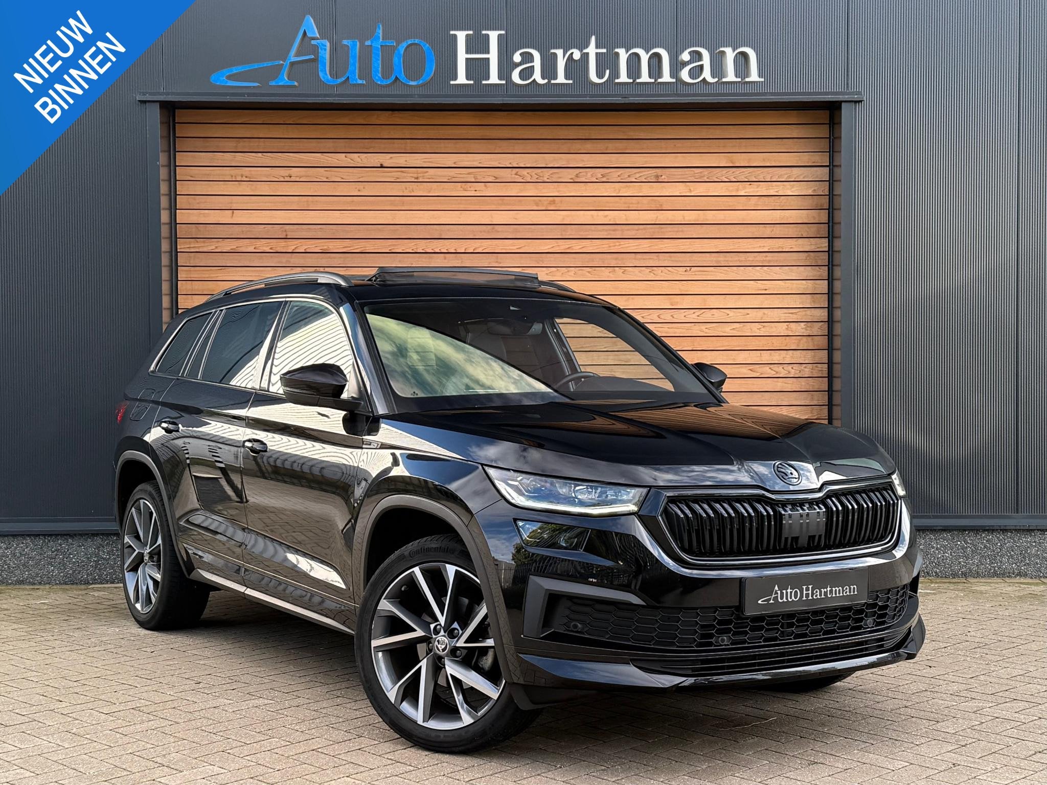 Skoda Kodiaq 1.5 TSI Sportline Business SPORTSTOELEN|TREKHAA, Auto's, Startonderbreker, 4 cilinders, 150 pk, Alcantara
