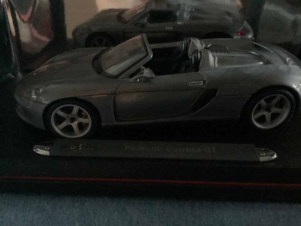 Porsche Carrera GT 1:18, Ophalen of Verzenden, Zo goed als nieuw, Auto, Maisto