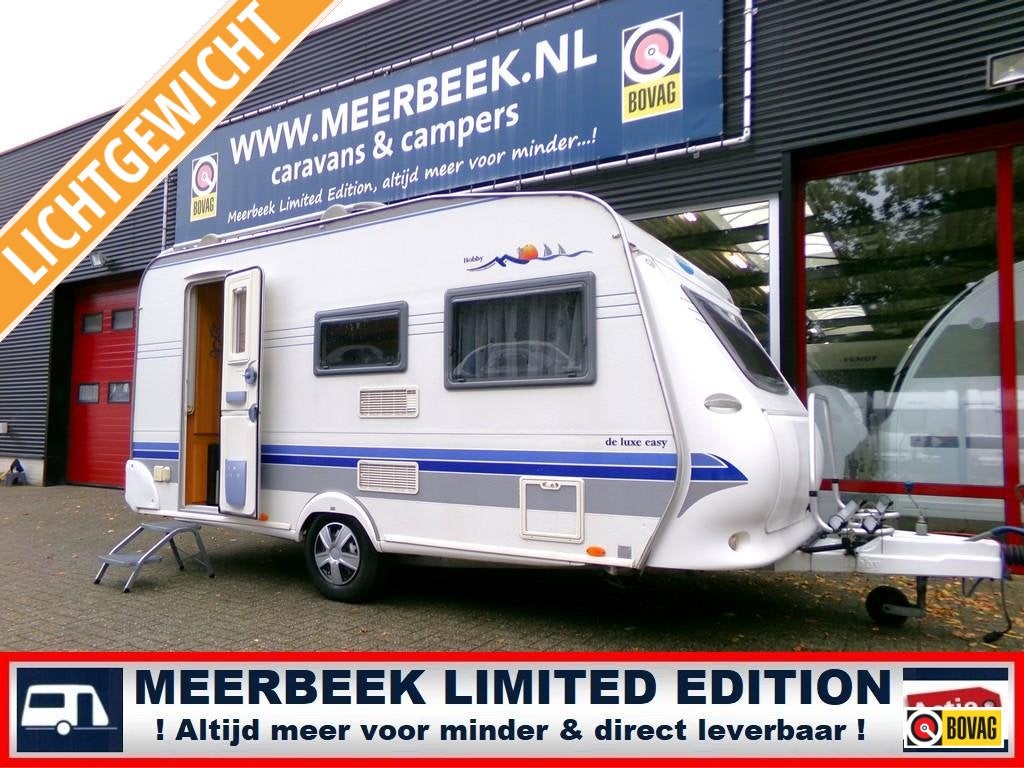 Hobby De luxe Easy 440 +VOORTENT +FIETSREK +RESERVEWIEL+ETC, Caravans en Kamperen, Hobby, 1000 - 1250 kg, Dwarsbed, Fietsenrek