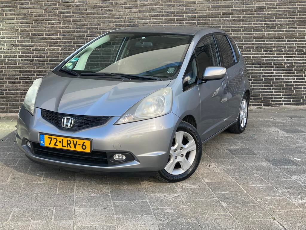 Honda Jazz 1.4 Comfort 2010 Grijs Nap ✅Nieuwe Apk Trekhaak, Voorwielaandrijving, 1046 kg, 40 €/maand, Zwart