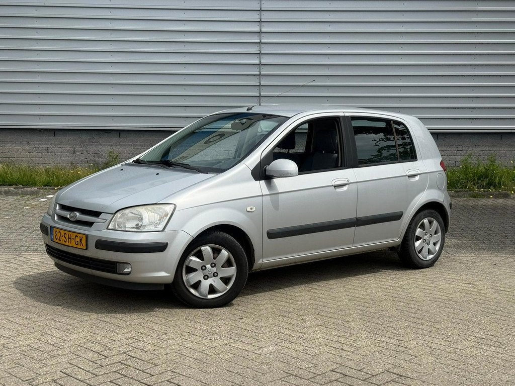 Hyundai Getz 1.3i Dynamic Automaat (CRUISE), Auto's, Hyundai, Zwart, 4 cilinders, Bedrijf, Getz