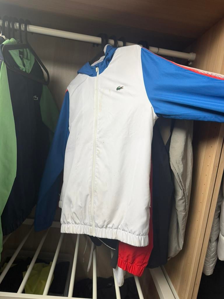 Lacoste trainingspak heren maat s incl broek, Kleding | Heren, Jassen | Winter, Ophalen of Verzenden, Zo goed als nieuw, Blauw