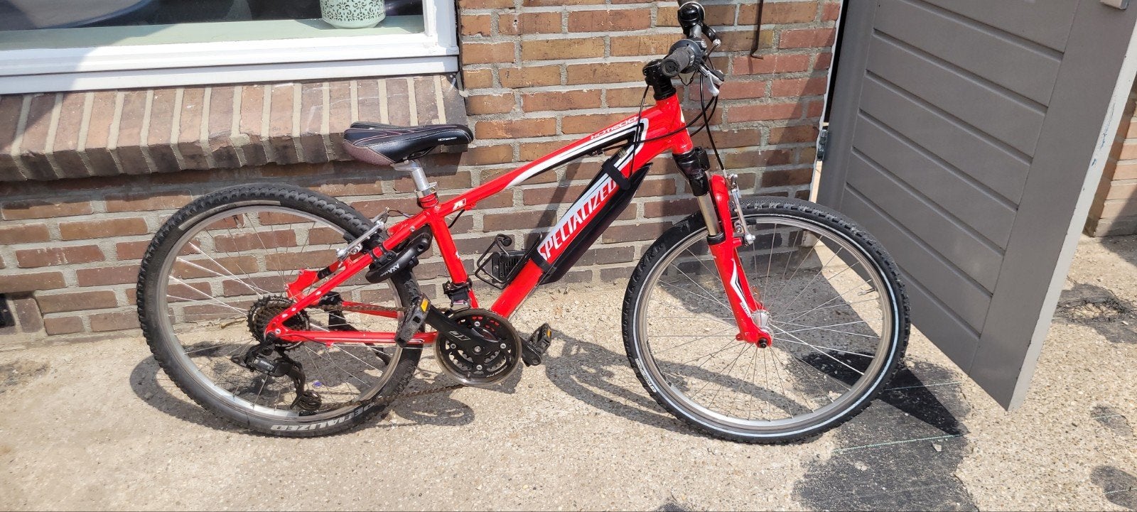 Specialized Hotrock 24 inch kinderfiets rood, 24 inch of meer, Gebruikt, Velgrem, V-brakes