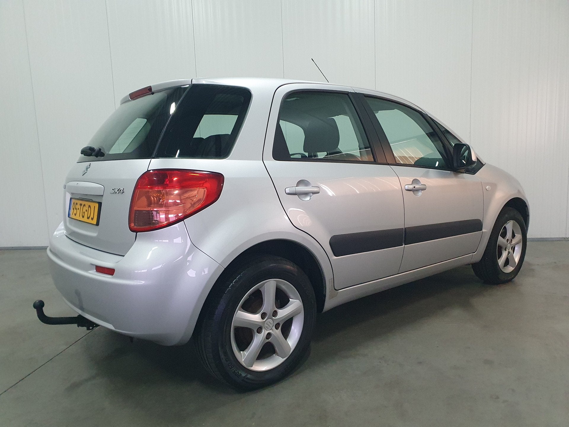 Suzuki SX4 1.6 Exclusive LMV/TREKHAAK/EL.PAKKET . (bj 2006), Auto's, Voorwielaandrijving, Gebruikt, Metallic lak, 4 cilinders