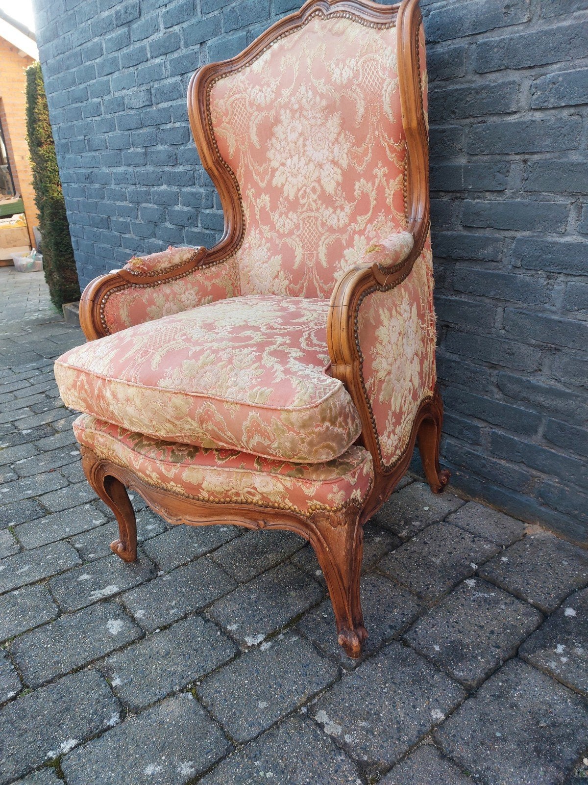 Antieke fauteuil met roze bloemenstof, Ophalen