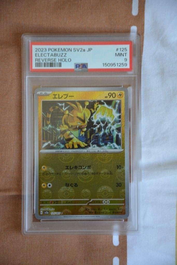 Electabuzz Pokeball Reverse Japans PSA 9, Ophalen of Verzenden, Gebruikt, Losse kaart, Foil