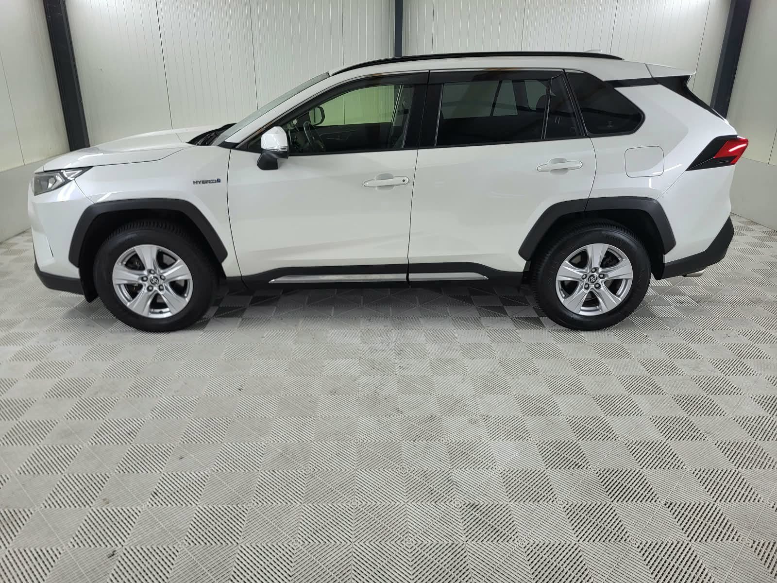 Toyota RAV4 2.5 Hybrid Comfort, Camera, Parelmoer kleur, Auto's, Dealer onderhouden, Stof, Gebruikt, 4 cilinders