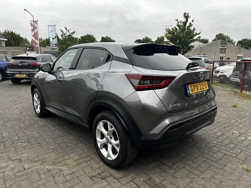 Nissan Juke 1.0 DIG-T Acenta Navigatie | Camera, Auto's, Nissan, Voorwielaandrijving, Stof, Met garantie (alle), Bedrijf