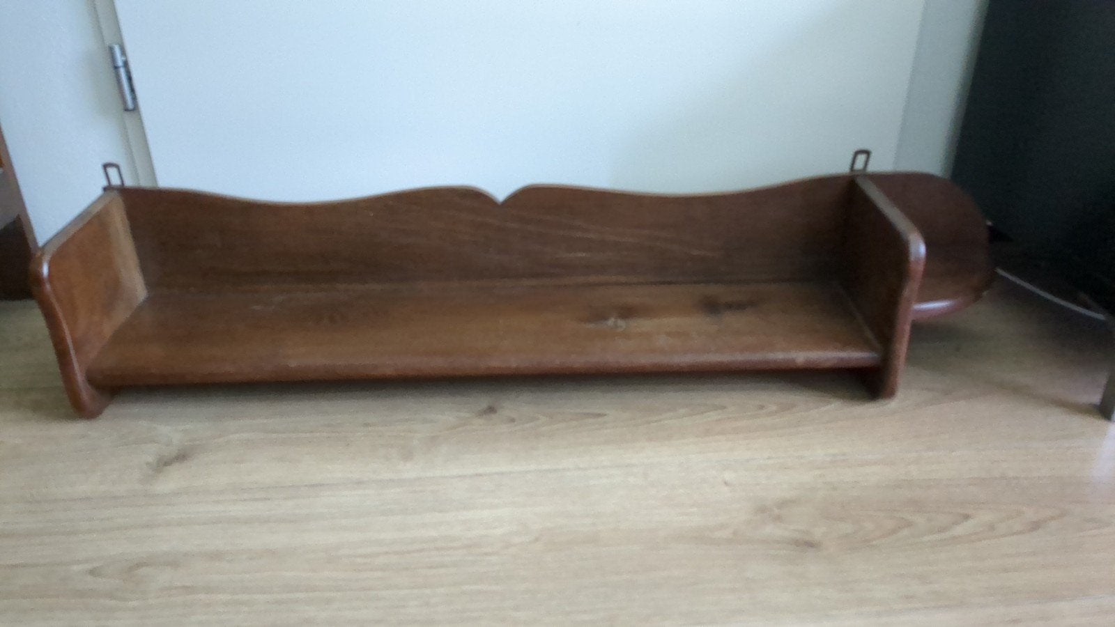 Boekenplank wandrek, Ophalen