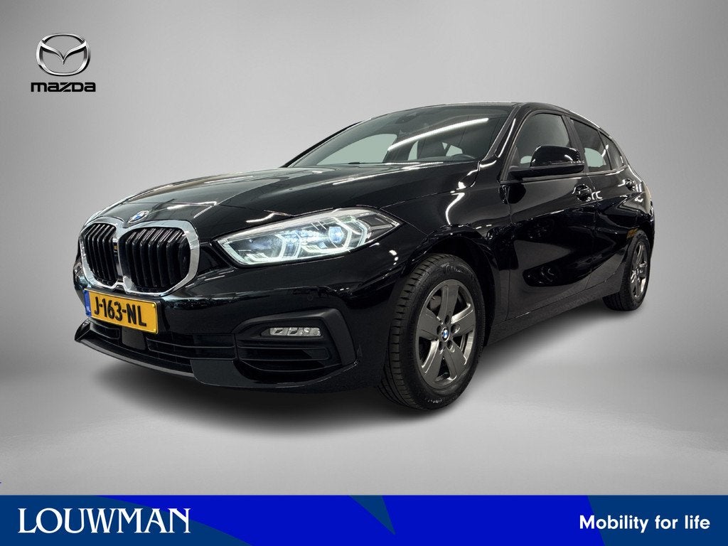 BMW 1-serie 118i Executive Edition / Trekhaak / Virtual Cock, 12 maanden, Stof, Gebruikt, Zwart
