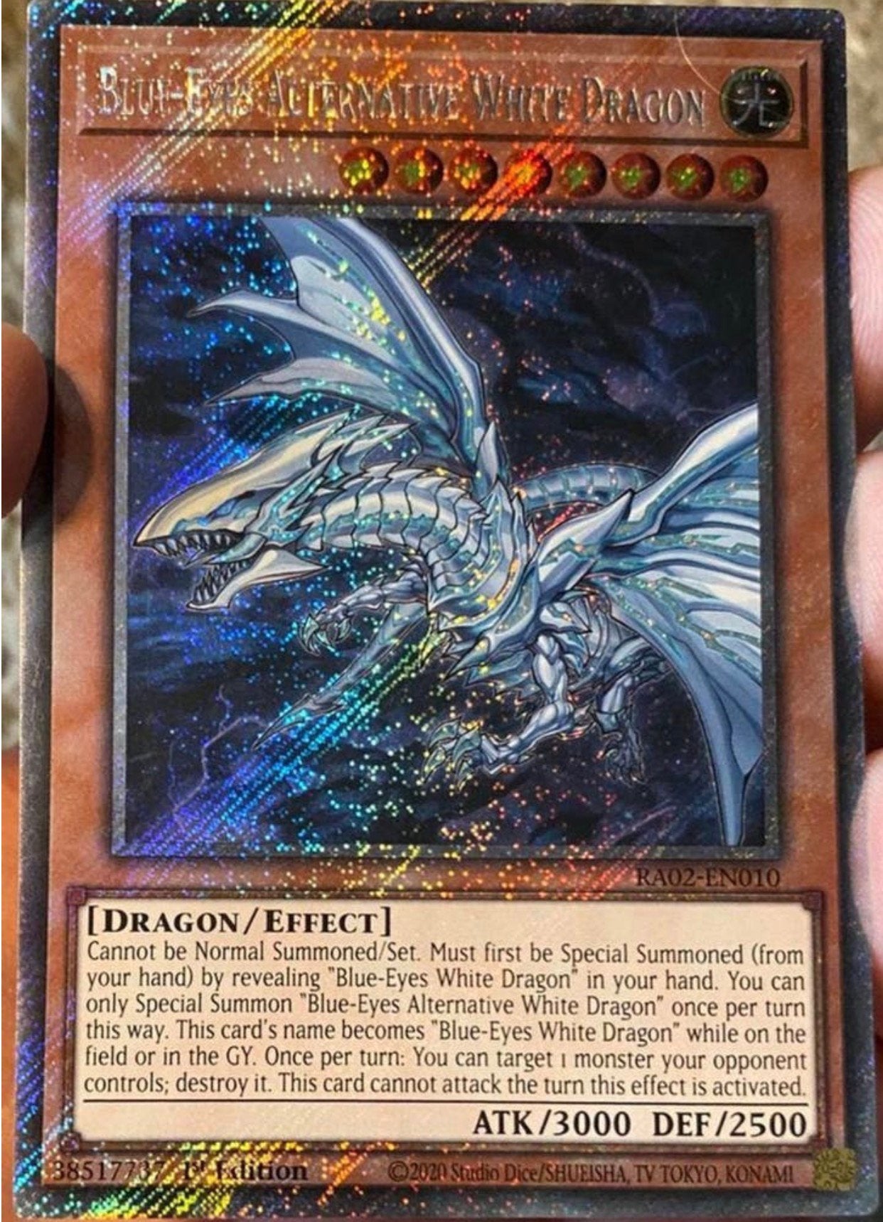 Yu-Gi-Oh! Blue Eyes Alternative Dragon RA02 1st Edition !, Hobby en Vrije tijd, Verzamelkaartspellen | Yu-gi-Oh!, Ophalen of Verzenden