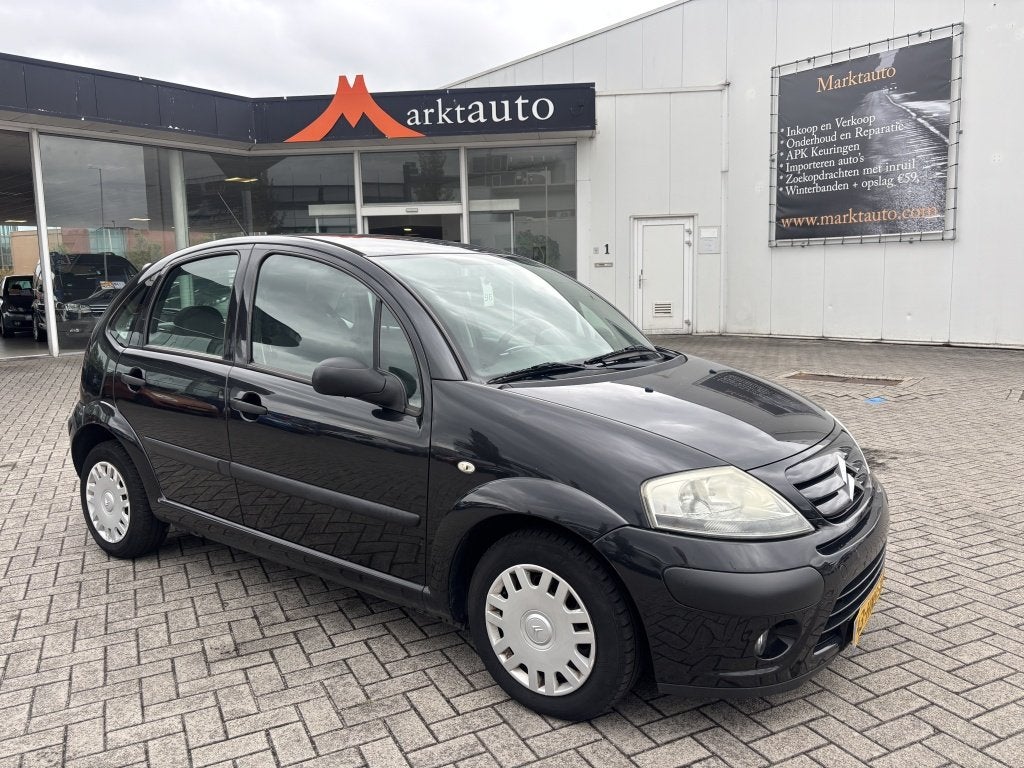 Citroën C3 1.1i Ligne Prestige met Airco (bj 2009), Stof, 60 pk, 920 kg, Zwart