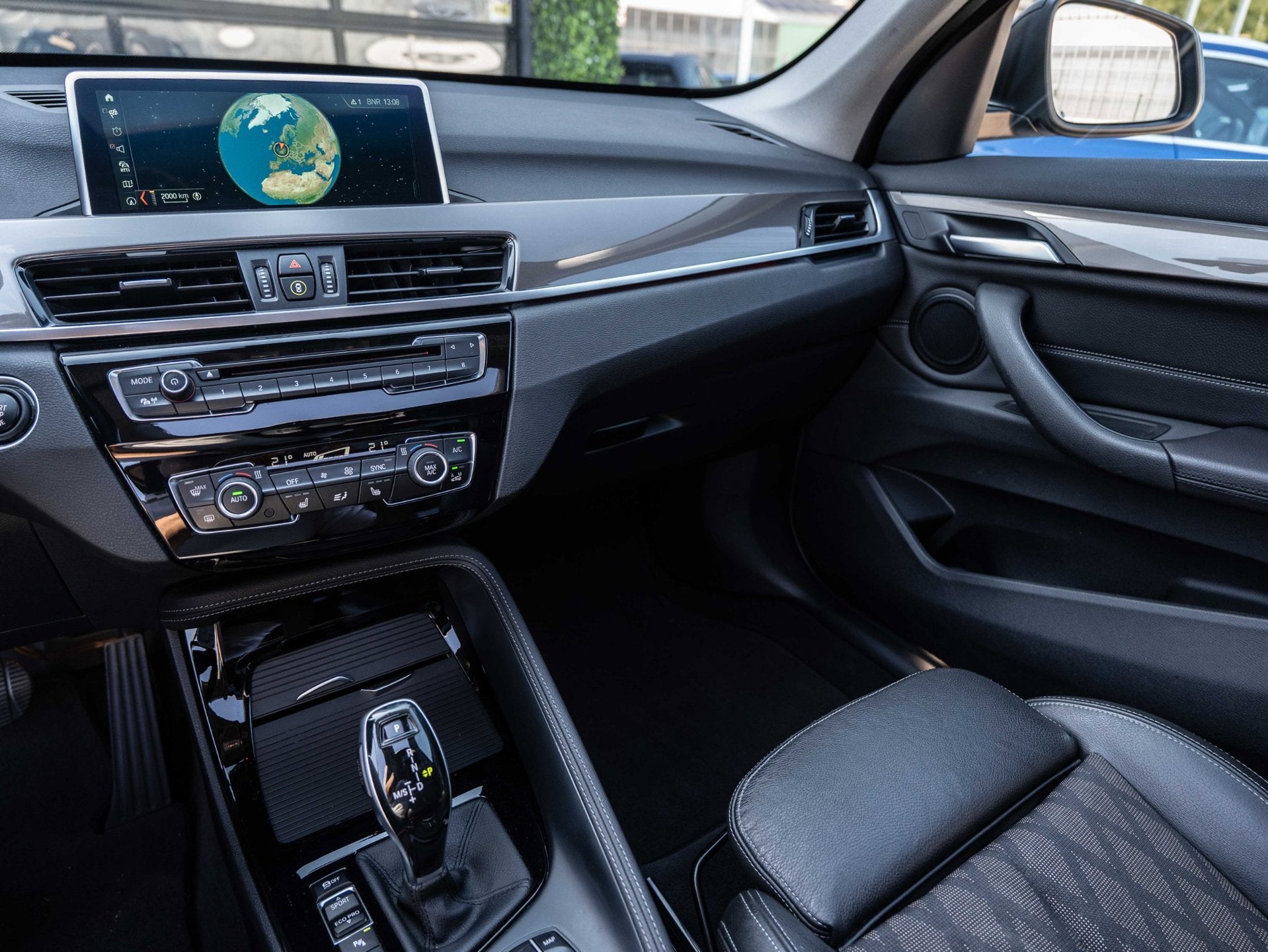 BMW X1 SDrive18i High Executive | X-Line | Pano | HUD | Deal, Auto's, Gebruikt, Zwart, Met garantie (alle), Leder en Stof