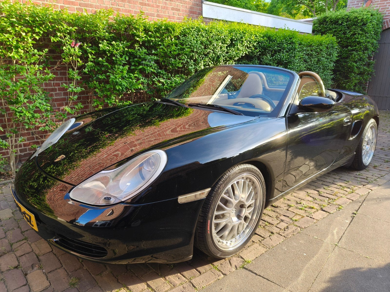 Porsche Boxster 2.7 2001 Zwart, Auto's, Porsche, Achterwielaandrijving, Beige, Zwart, 10 km/l
