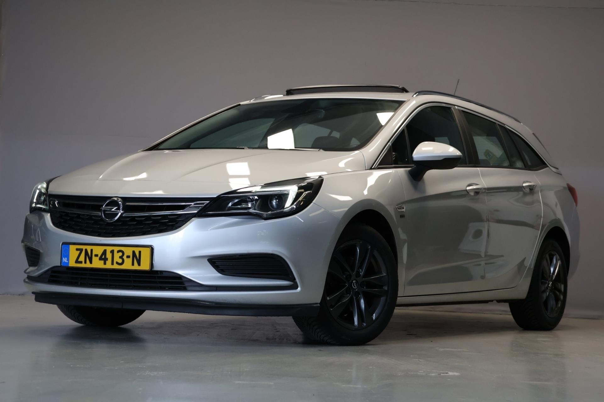 Opel Astra Sports Tourer 1.4 Turbo 120 Jahre|Automaat|Pano|C, Stof, Gebruikt, 150 pk, Origineel Nederlands