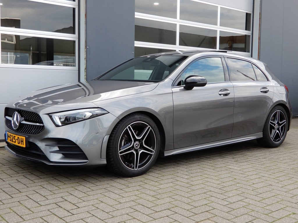 Mercedes-Benz A-klasse 200 Business Solution AMG Panoramadak, Auto's, Dealer onderhouden, Gebruikt, 4 cilinders, Leder en Stof