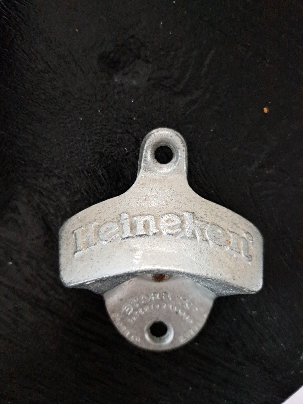 Vintage Heineken flesopener - wandmodel, Ophalen, Gebruikt, Gebruiksvoorwerp