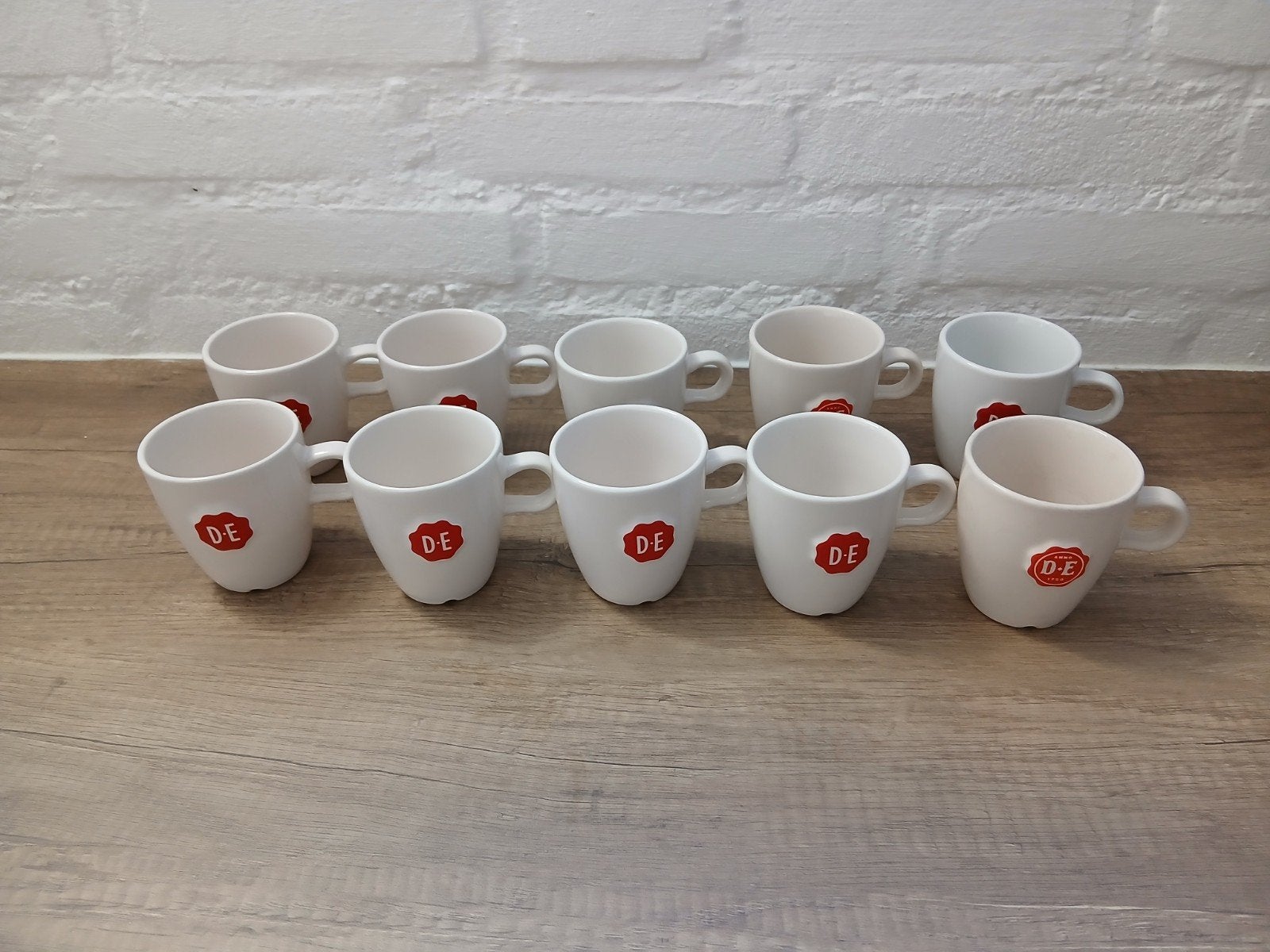 10 Douwe Egberts mokken, Huis en Inrichting, Ophalen of Verzenden, Gebruikt, Overige merken, Mok