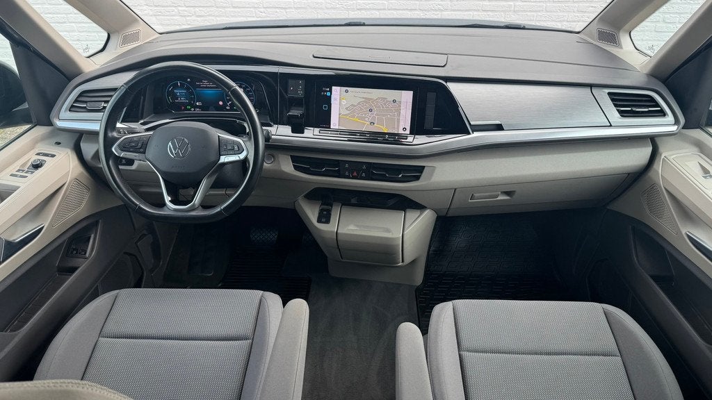 Volkswagen Multivan 1.4 eHybrid L2H1 SOH 97% Trekhaak 1600kg, Auto's, Volkswagen, Stof, Gebruikt, Euro 6, 138 €/maand