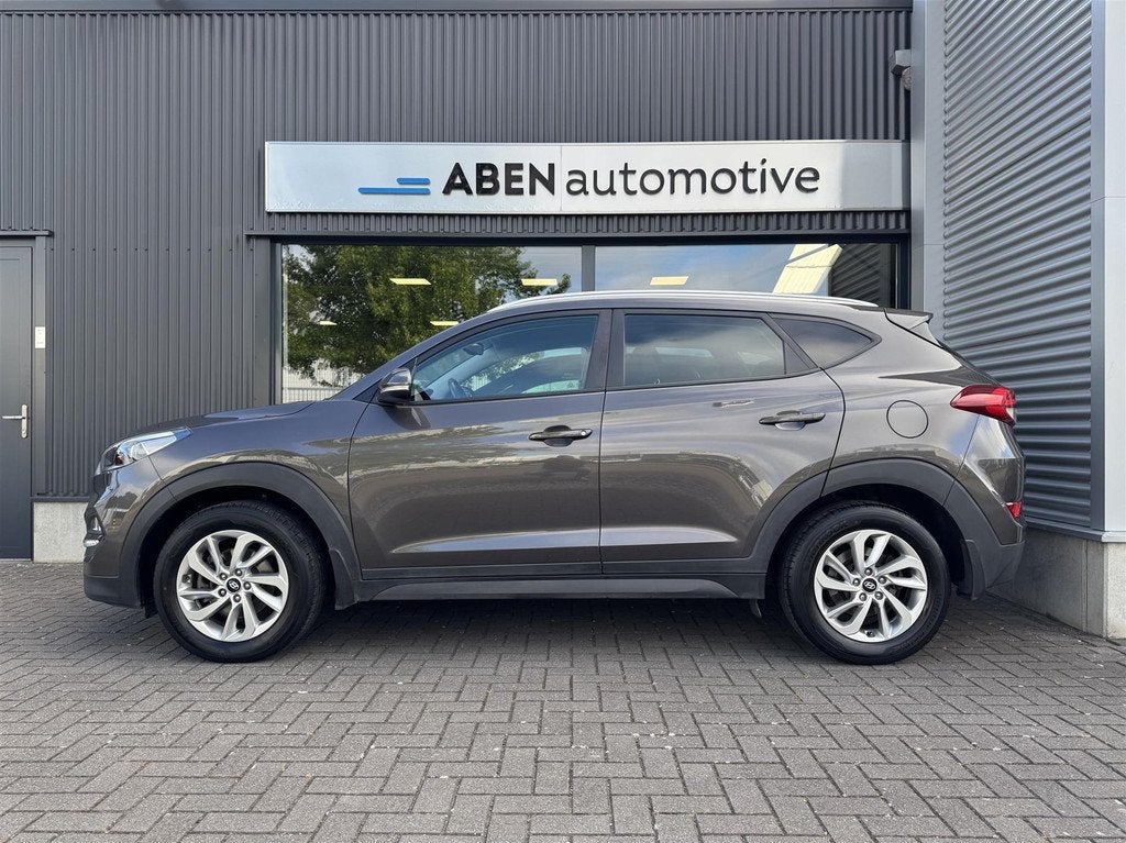 Hyundai Tucson 1.6 T-GDI 177PK 4WD Comfort automaat (NAVI|CA, Auto's, Hyundai, 4 cilinders, Bruin, 1434 kg, Bedrijf