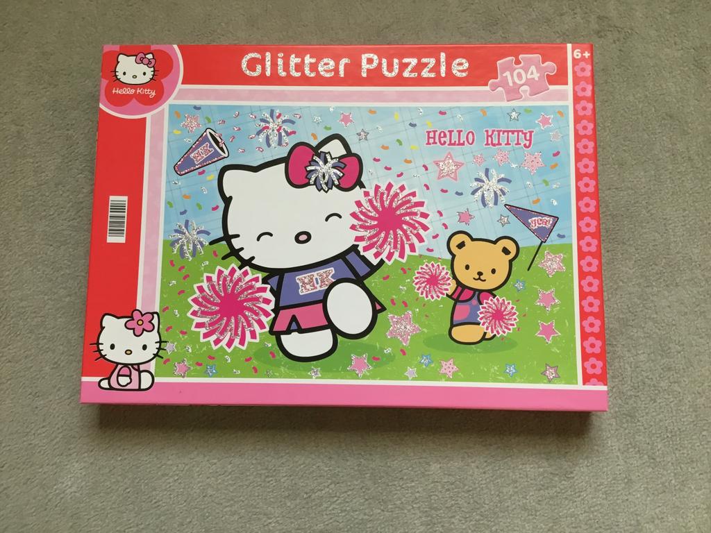 Hello Kitty glitter puzzel van 104 stukjes. Compleet, Ophalen of Verzenden, Meer dan 50 stukjes, Zo goed als nieuw