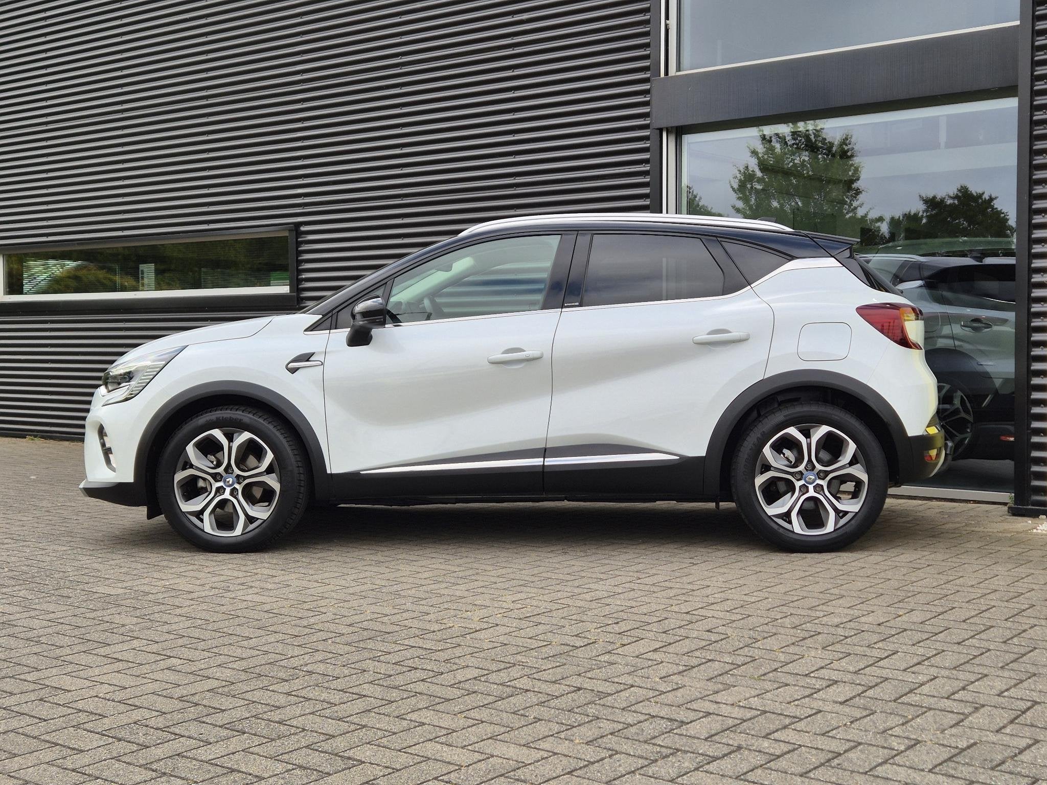 Renault Captur 1.6 E-Tech Plug-in Hybrid 160 Edition One Tre, Auto's, Renault, Dealer onderhouden, Stof, 4 cilinders, Wit